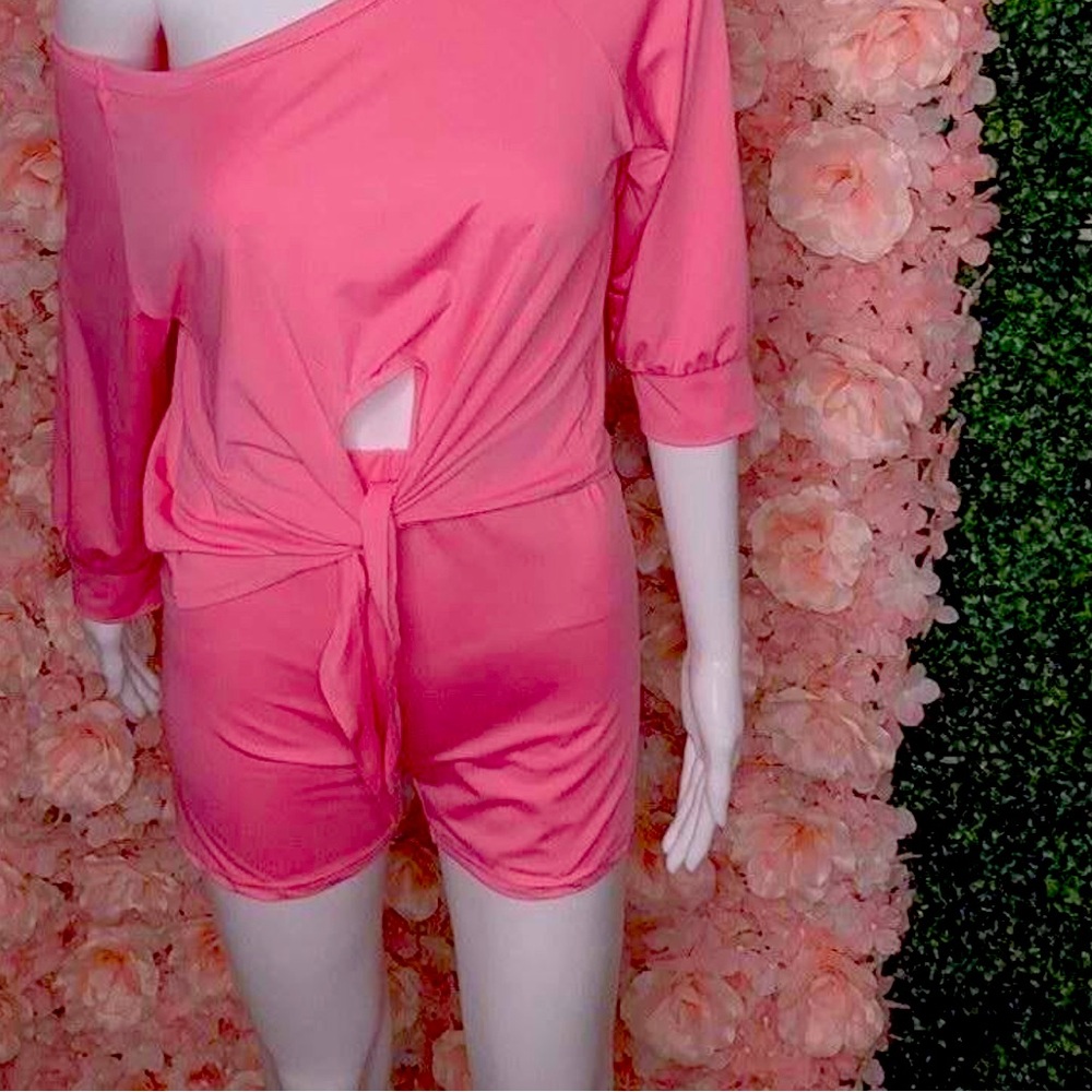 Mundefies Two-piece short cotton candy stretching material with a tie up option.